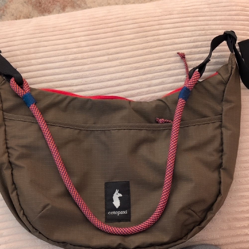Cotopaxi Crossbody Bag with Pink Accents